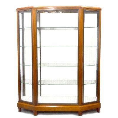 an image of a corner display case with glass shelves