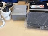 many cameras that are sitting on a table
