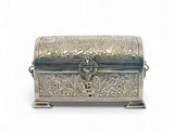 an antique silver box with a lock on a white background
