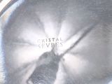 a silver plate with a picture of a person on it
