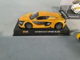 a yellow toy car and a yellow toy car on a table