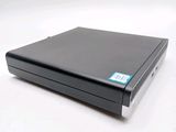 a black dvd player sitting on a white surface