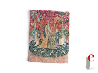 the lady and the unicorn tapestry is hanging on the wall
