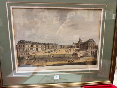 tableau représentant la vue d'un palais, encadré et posé sur une table