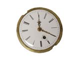 a clock with roman numerals on the face of it