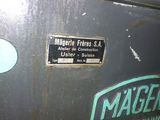 a sign on the side of a machine that says mauerr