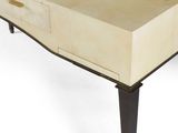 a small table with a drawer on top of it