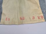 a piece of cloth with numbers on it on a table