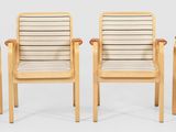 four wooden chairs sitting next to each other on top of a white floor
