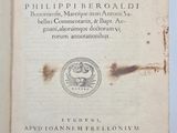 an open book with a picture of a seal on it