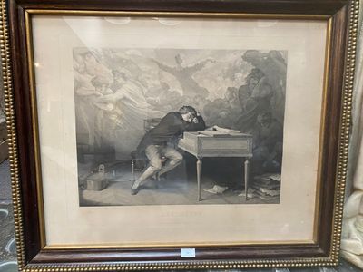 an old picture of a man sitting at a desk in front of a mountain