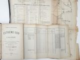 an old book opened to show a map of the world