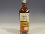 an image of a bottle of whisky sitting on a table