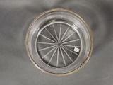 a glass plate with a circular design on it