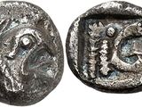 une pièce de monnaie en argent portant l'image d'un homme et d'une femme