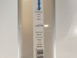a bottle of water sitting on a counter with a sticker on it