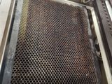 an image of a machine that has a grill in it