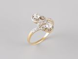 a gold and diamond bypass ring