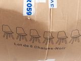 a cardboard box that has a bunch of chairs on it
