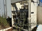 a machine that is sitting outside of a building
