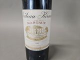 a bottle of wine that is sitting on a table