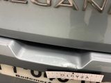 a close up of a car with a sticker on it ' s bumper