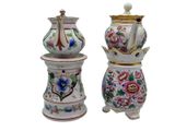 two vases that have been decorated with flowers on them