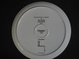 a white plate with a black and white label on it