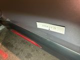 a sticker on the side of a car that says waitto