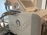 a machine that is sitting on a table in front of a mirror