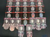 a display of many pairs of socks with pictures on them
