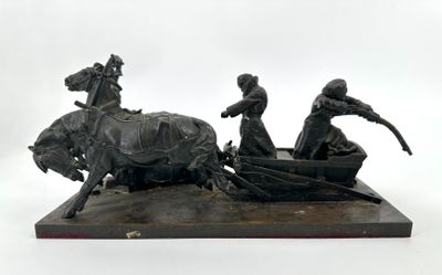 statue représentant un homme et une femme dans une calèche