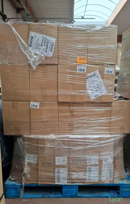 a large stack of boxes sitting on a pallet in a warehouse