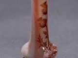 a small vase that is sitting on a table