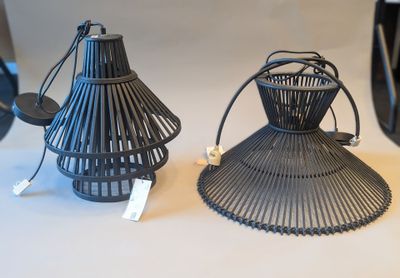 two lamps that are sitting on a table