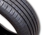 the tire of a car is shown with a sticker on it