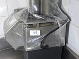 a machine that is sitting in the middle of a kitchen