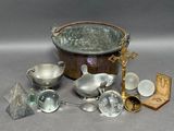 a lot of silver items that are on the table