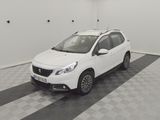 a picture of a white car parked in a garage