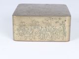 an old silver metal box with a drawing on it on a white surface
