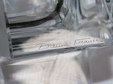 a close up of a piece of glass with a label on it