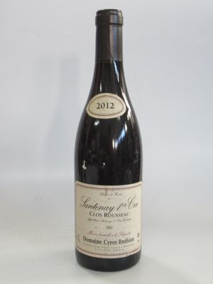 a bottle of wine that is sitting on a table