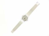 a watch that is sitting on a white surface