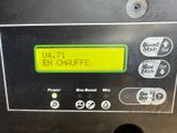 a close up of a machine with buttons on it