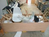a picture of a wooden box filled with chairs and other items