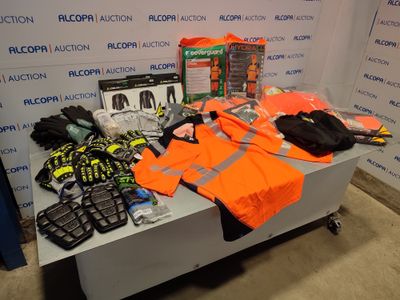 a table with a lot of items on it in front of a wall