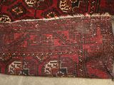 two rugs that are laying on the floor