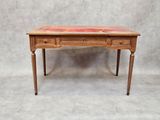 une petite table en bois avec un plateau en marbre et deux tiroirs