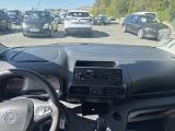 a view of a parking lot from the inside of a car