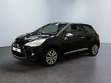 a black citrole is parked in a white room